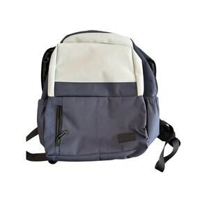 Duchamp Blue White Rubberized Two-Tone Roll Top Backpack